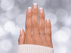 Top-down view of short square soft pink glossy French tip press-on nails, showcasing the sharp lines of the white smile line.